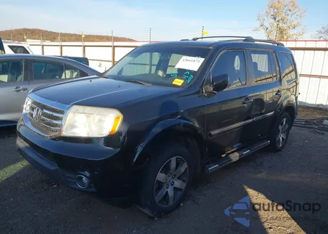 2012 Honda Pilot Touring z USA, uszkodzony, nr VIN 5FNYF4H97CB037239